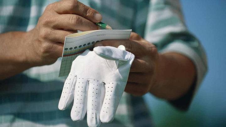 save strokes, Low Handicap Club Setup, Man signing scorecard